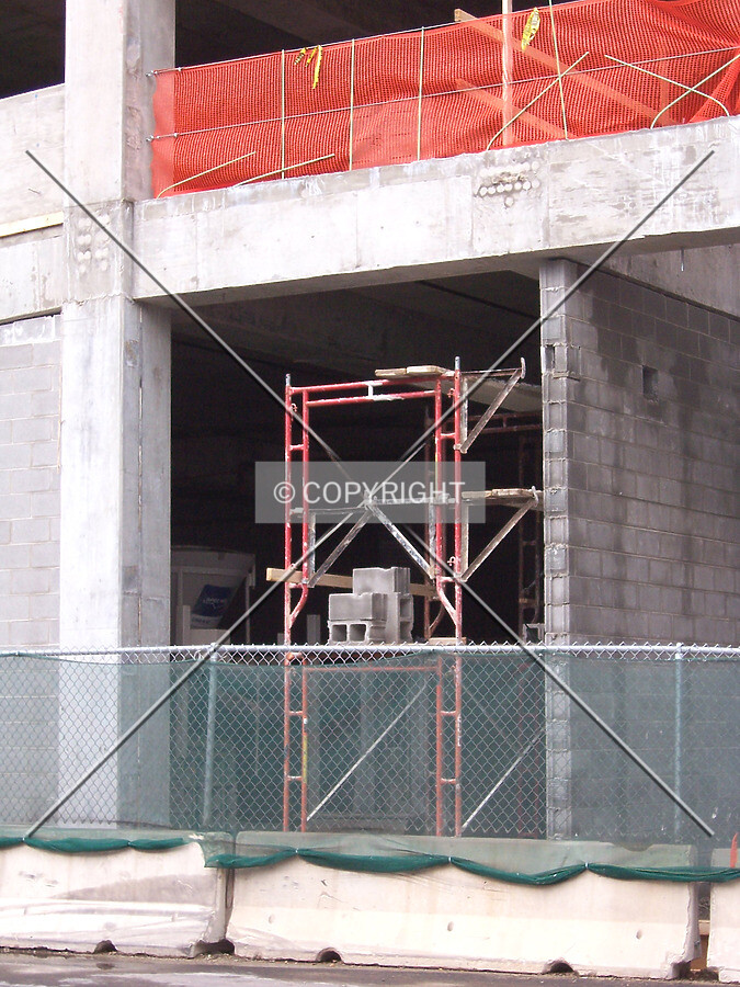 Filling in the western wall of the base with concrete block