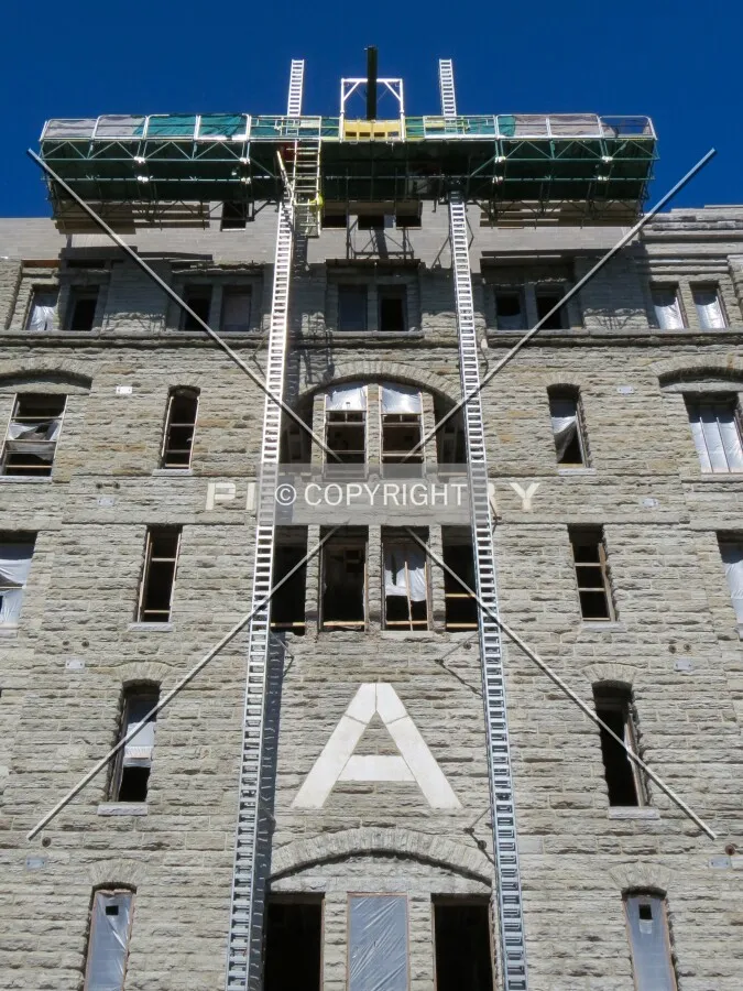 Looking up from Main Street SE during renovation into lofts