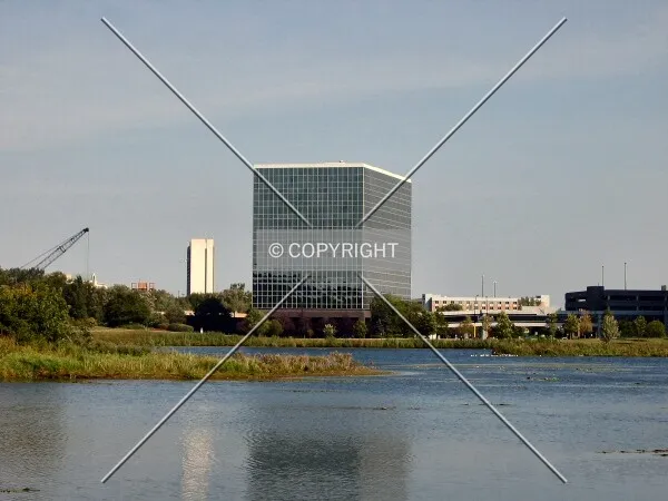 Distant view to the north, reflected in Hyland Lake