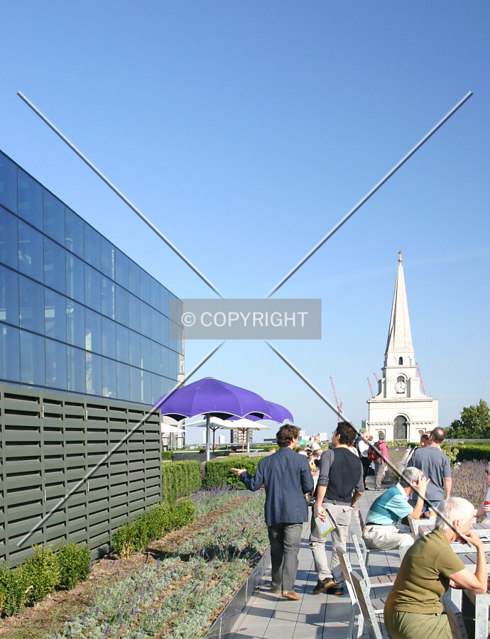Visitors quaff liquid refreshment on the sixth floor roof terrace