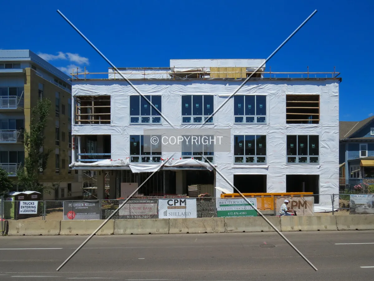 Full front elevation from across West Lake Street