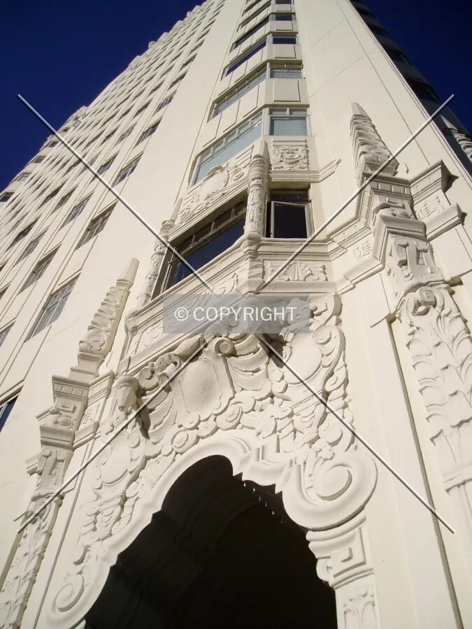 Looking up the northern edge of the eastern side, toward elaborate decorations above the main entrance
