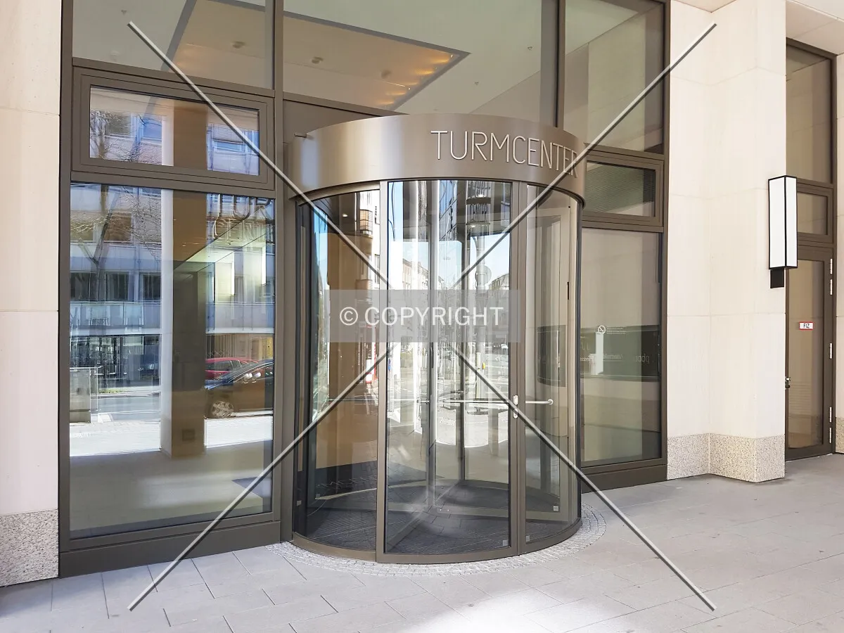 Rotating glass door