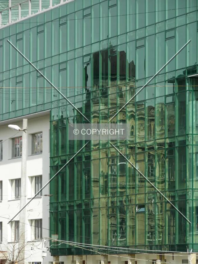 Detailed view with old building's reflection