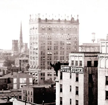 View from the southeast showing the original iron torches at the roof edge