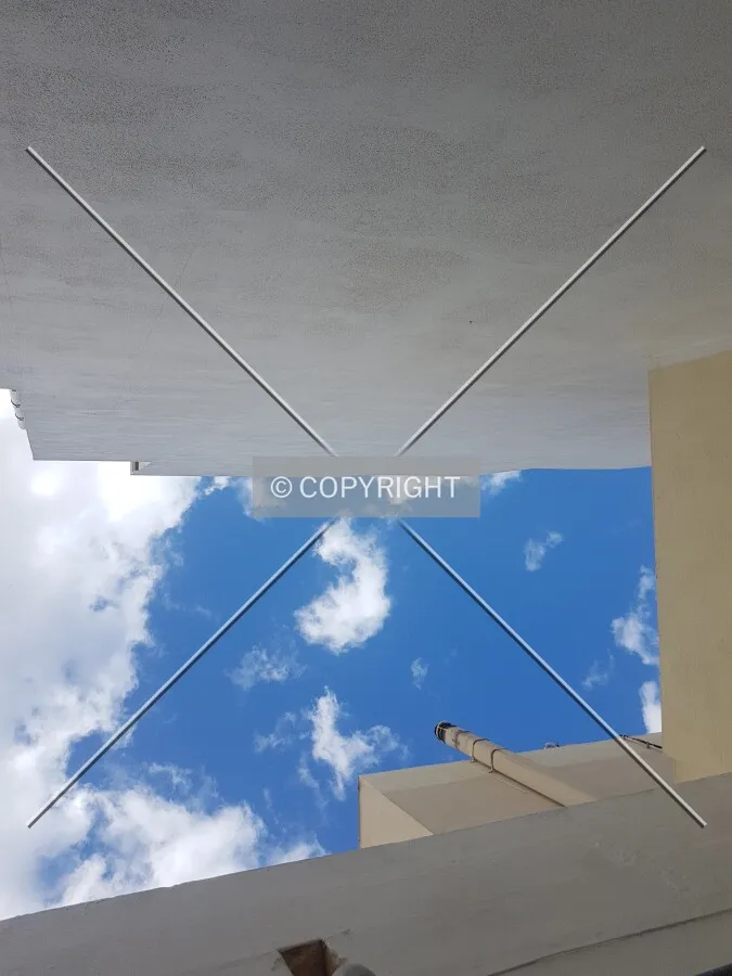 Walls without windows during a summer day