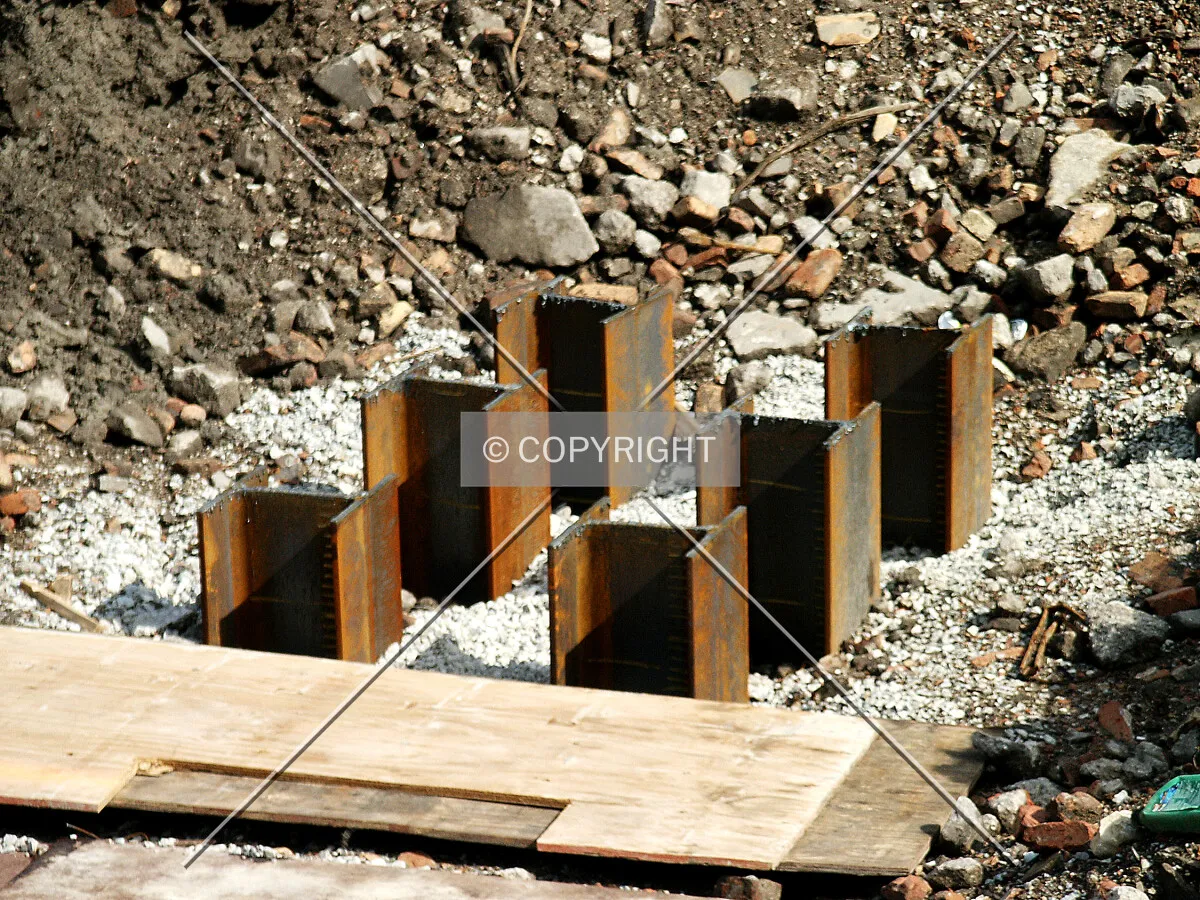 Pile tips sticking above the ground