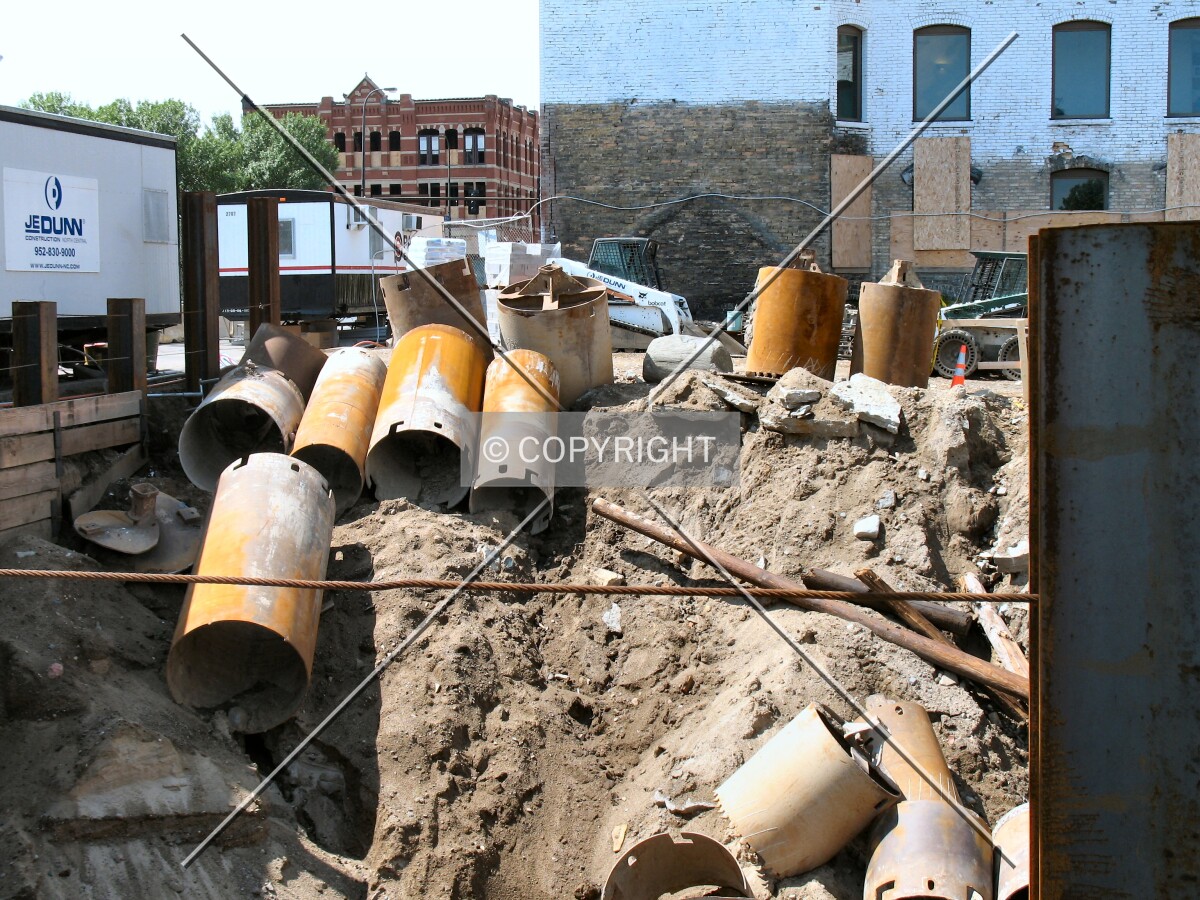 Discarded caisson tubes from 2nd Street South