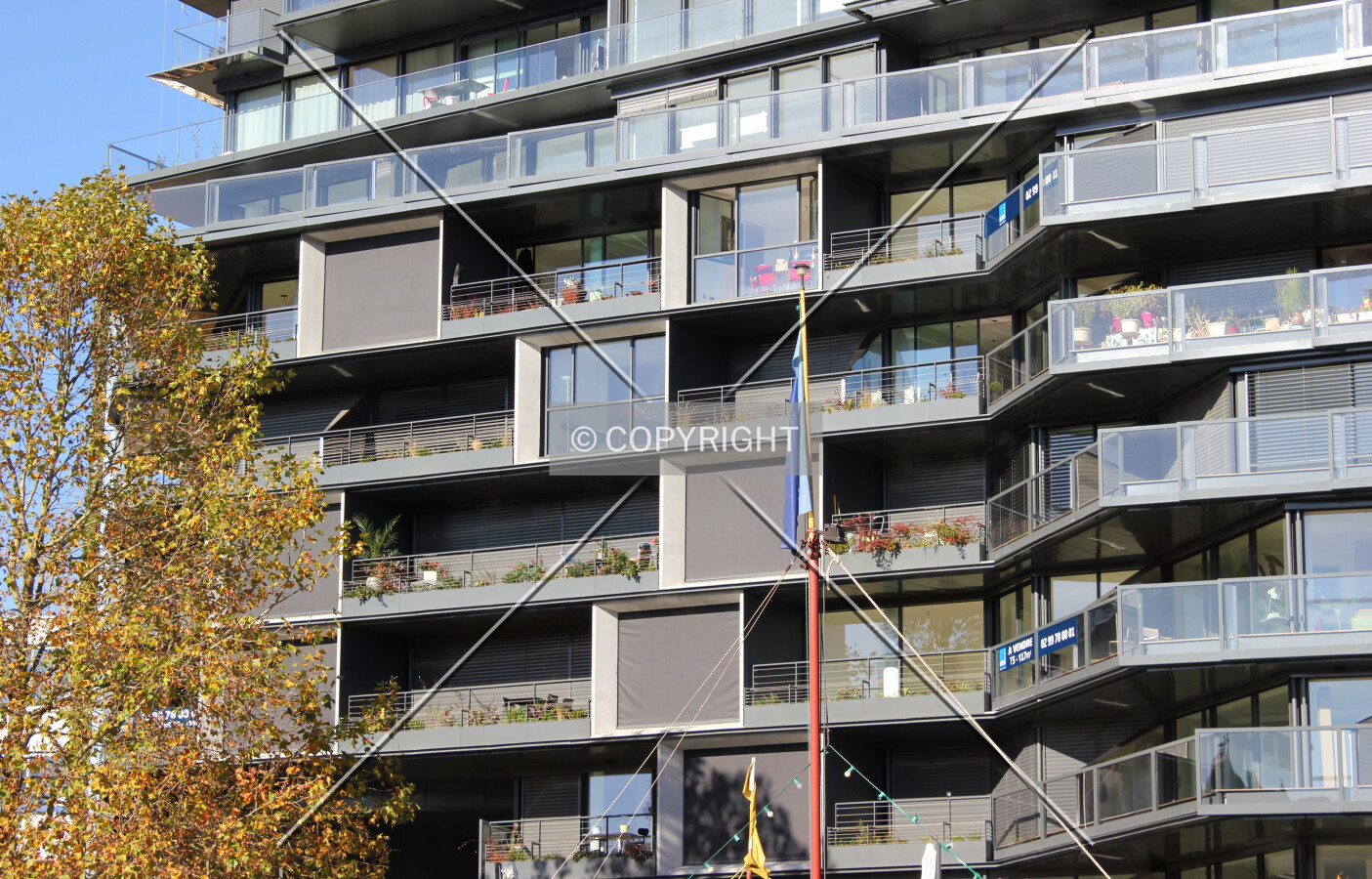Windows and balconies on the south face.