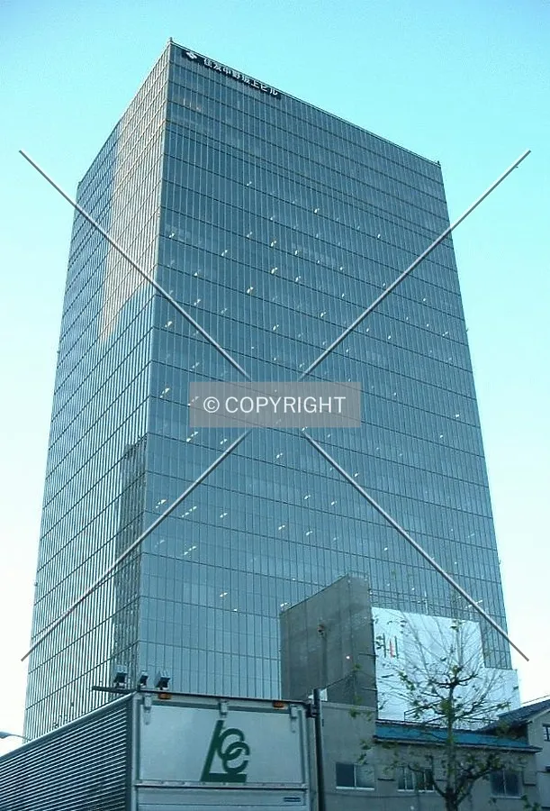 Skyscraper with local buildings
