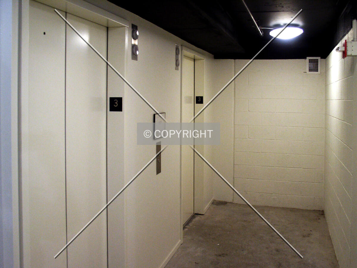 Elevators and hallway on the 3rd-floor garage level