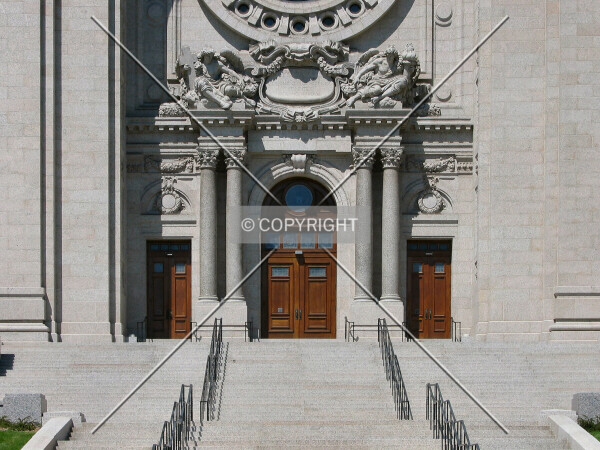 The grand stairs and main entrance from across John Ireland Boulevard/Summit Avenue