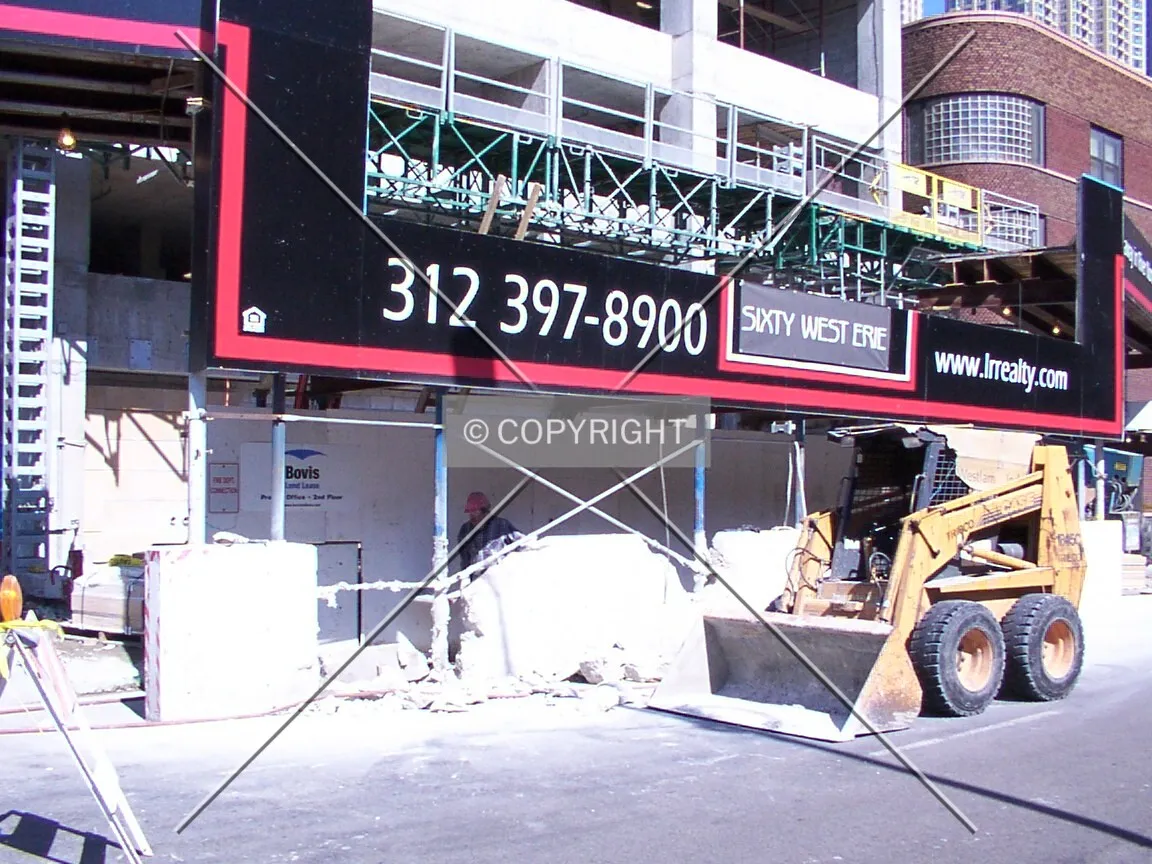 Demolishing the concrete barricade