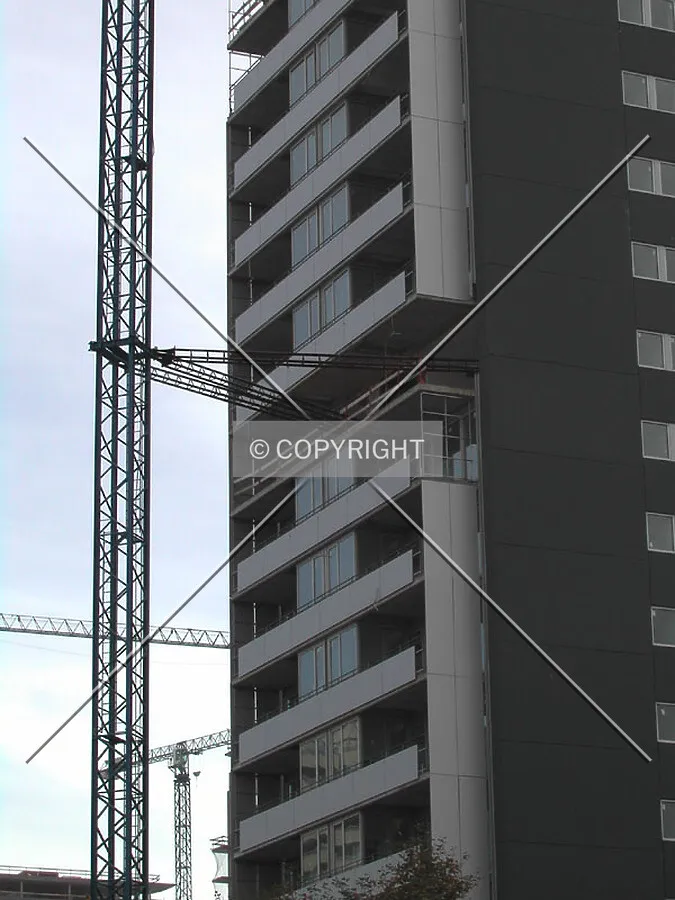 Closer view of crane's connection with the building