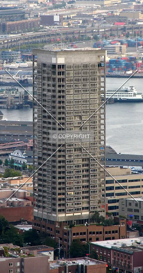 From the northwest on the Space Needle observation deck, in front of containers at the Port of Seattle