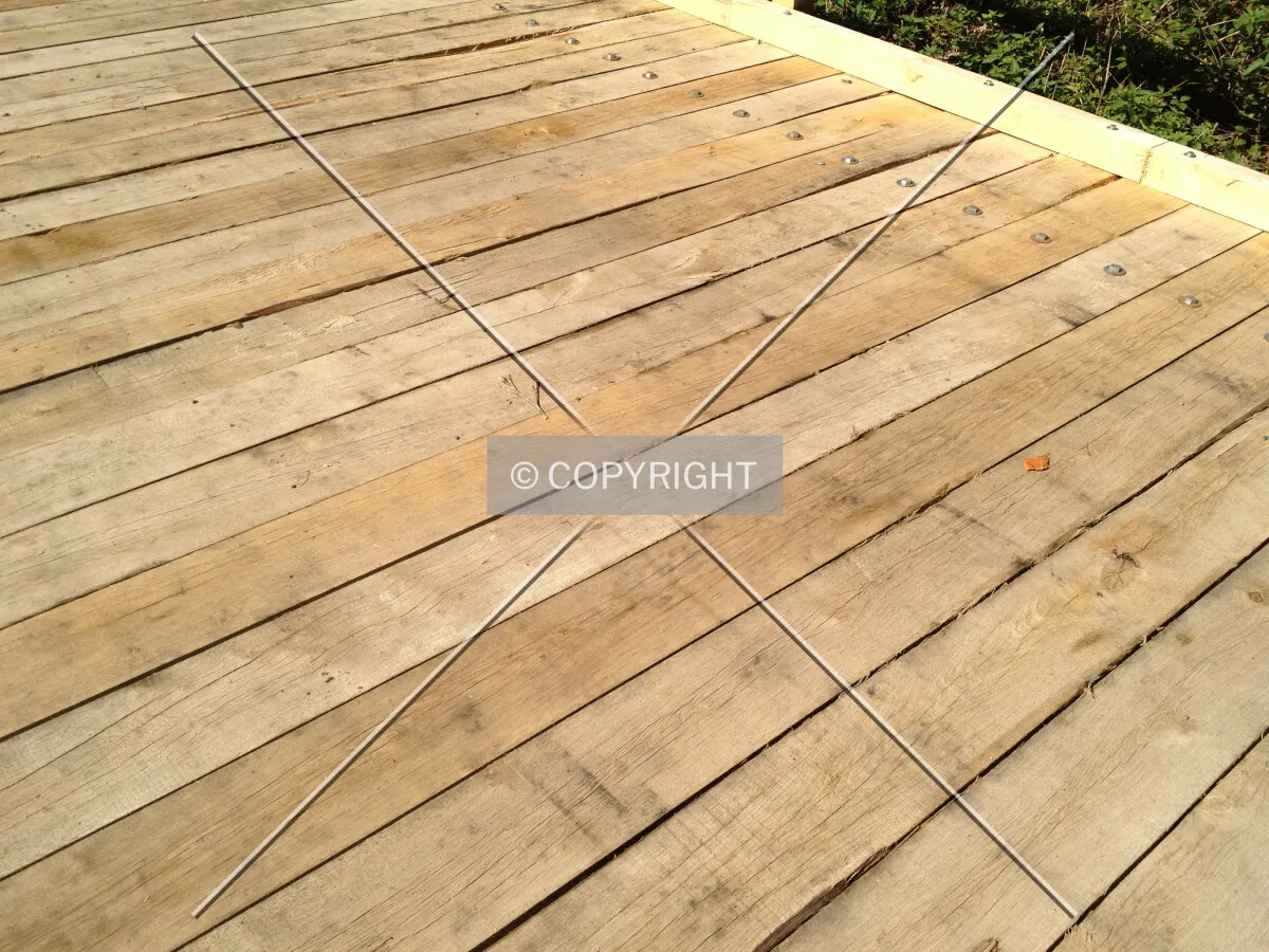 A bridge with a wooden flooring