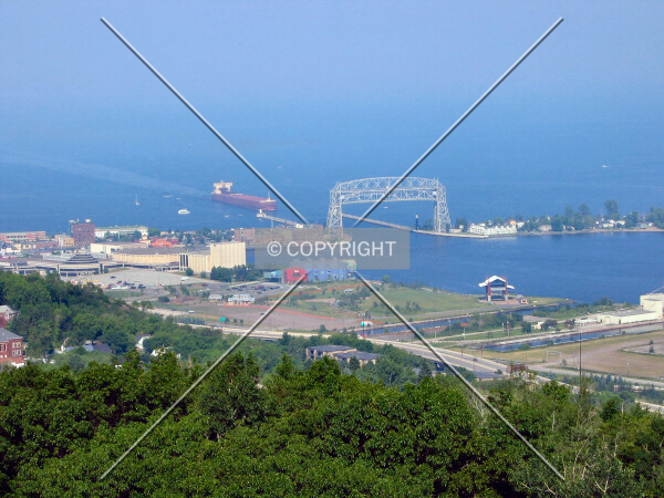 A massive freighter entering the Duluth Ship Canal, from Enger Tower