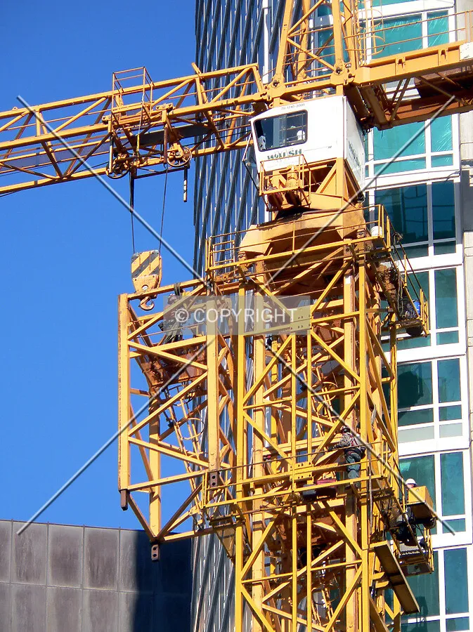 Removing a section of tower crane so that it can be lowered to the ground