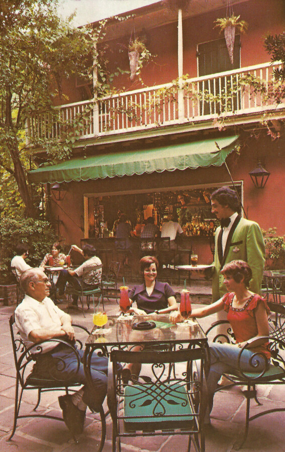 People socializing in the courtyard