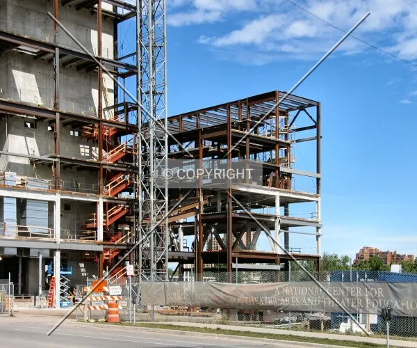 View to the north from 2nd Street South, through construction entrance