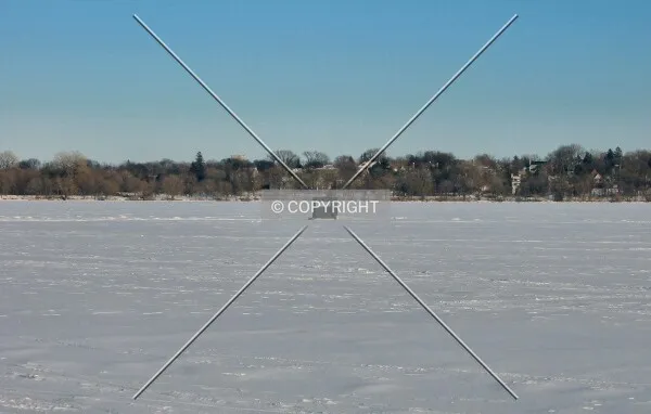 When temperatures dip below zero only one brave soul dares to ice fish on Lake Harriet