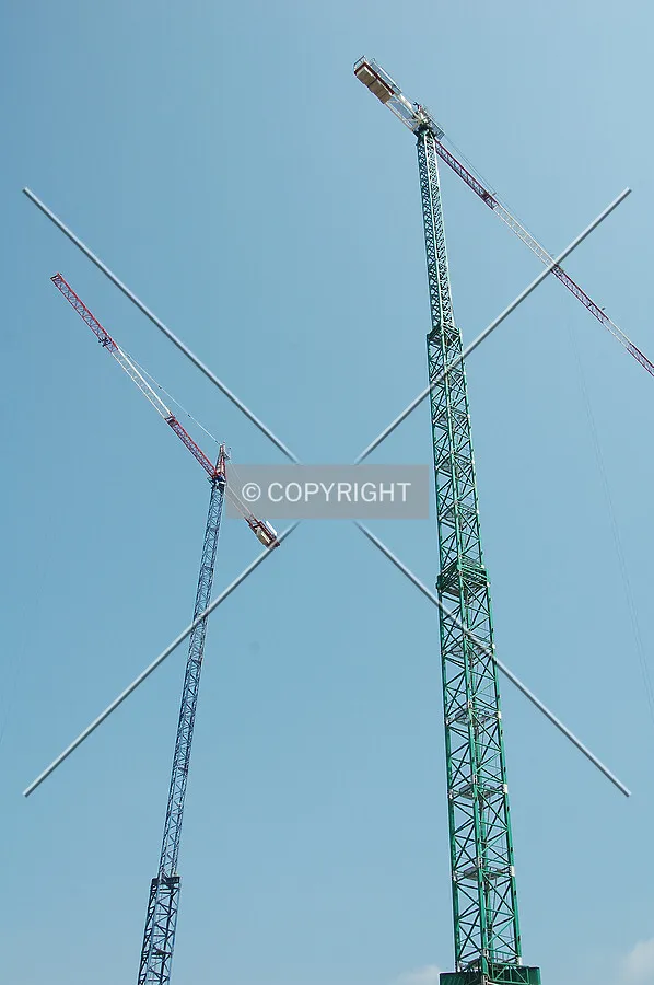 The two freestanding cranes that will work on the building's construction
