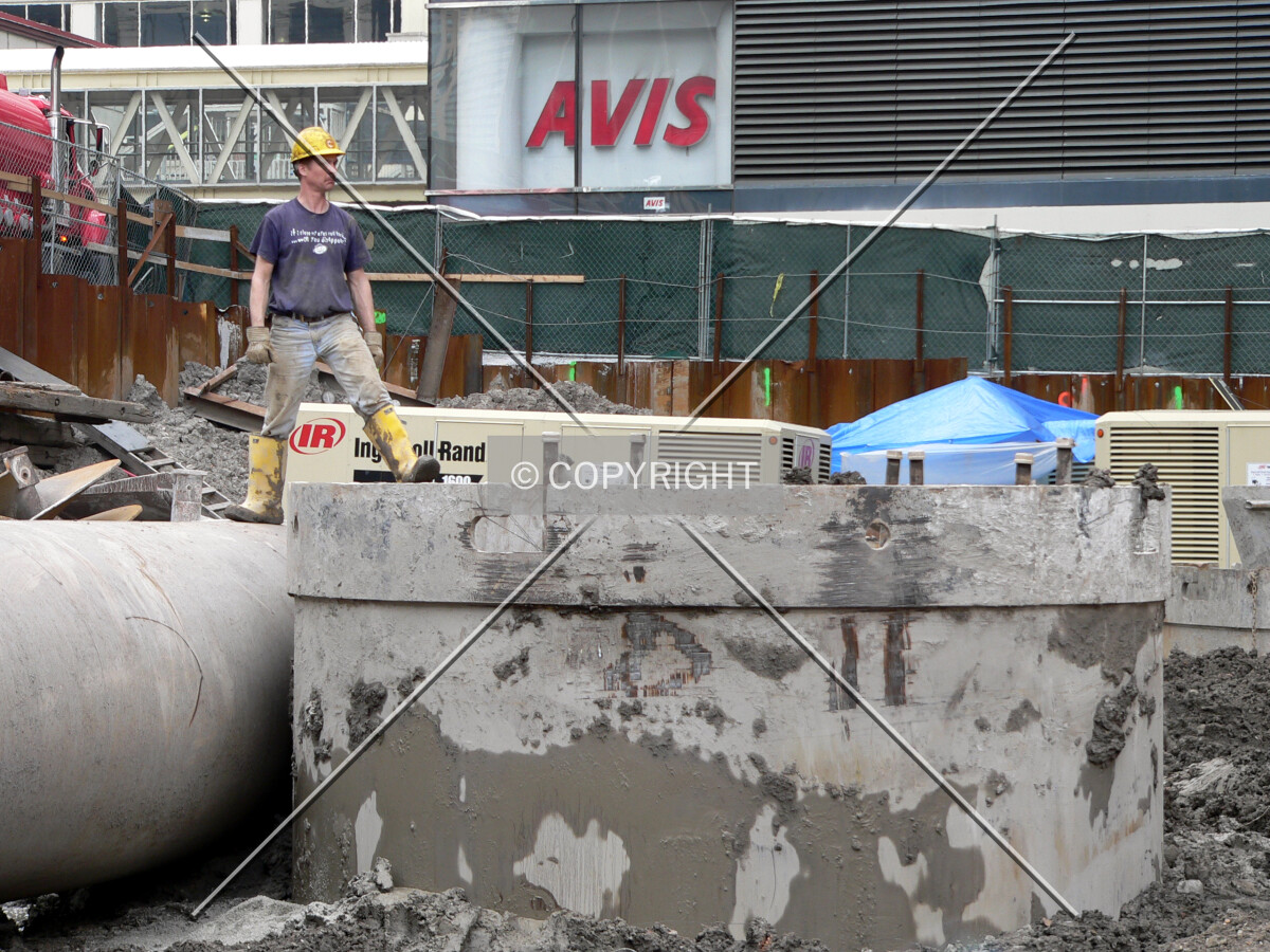 A worker observing the construction