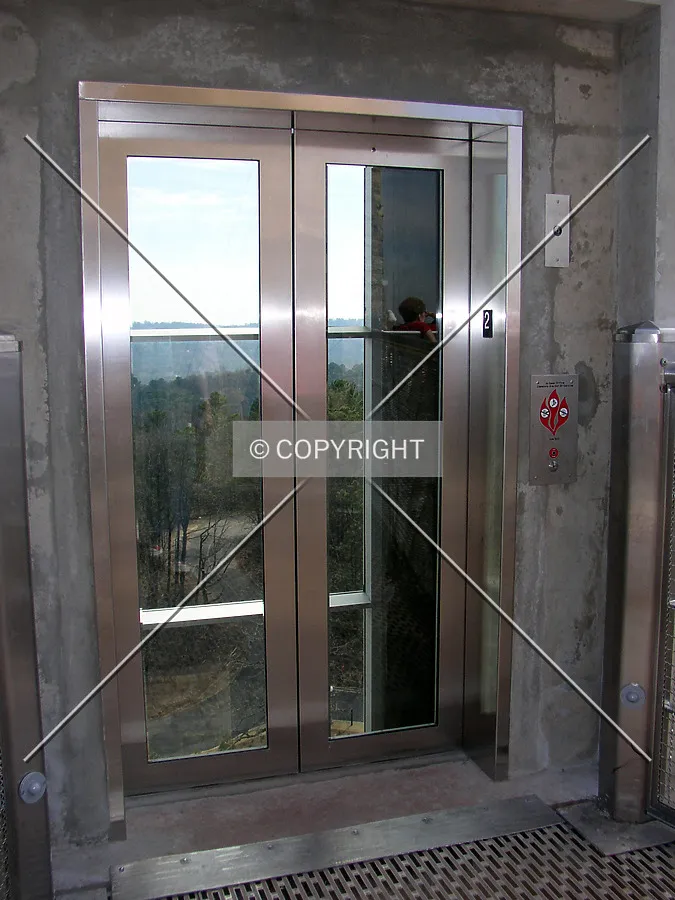 Glass elevator at the top of the pedestal