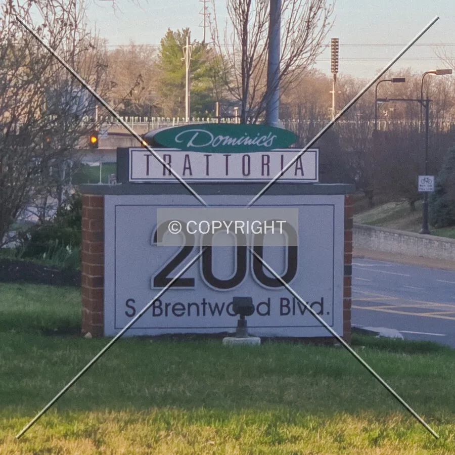 Early morning view of the signage along Brentwood Boulevard; March 22, 2025
