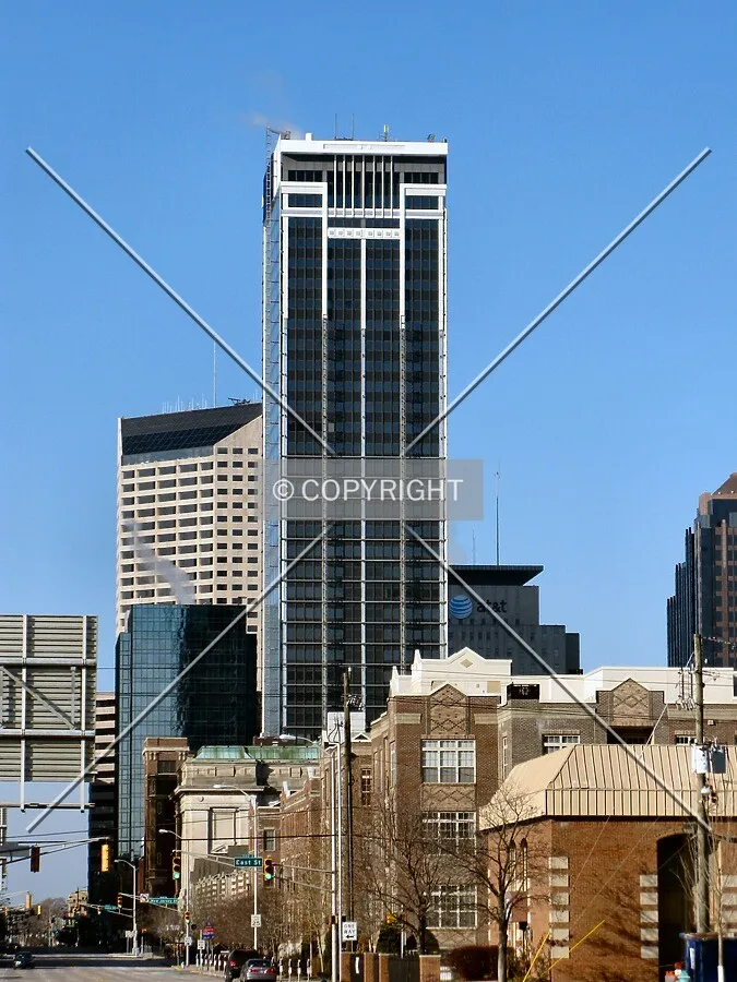 Distant view to the west along East Ohio Street; partial frame for new facade visible