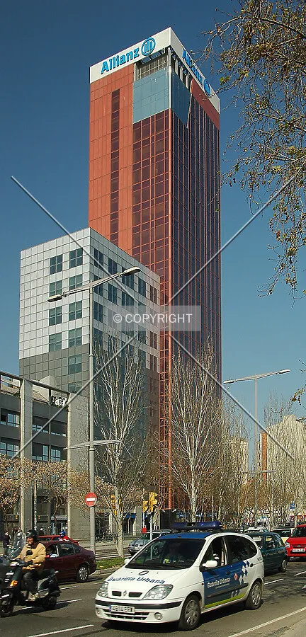 A police car passing by Torre Allianz