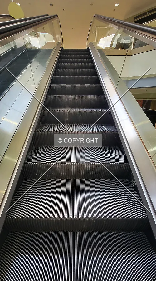 The up escalator in the central atrium; November 2, 2023