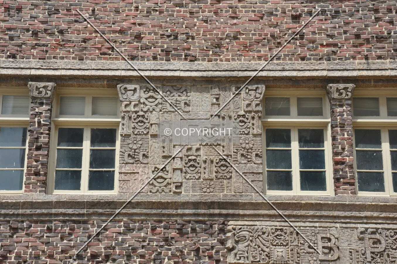 Detail of Mayan terra cotta work on east facade