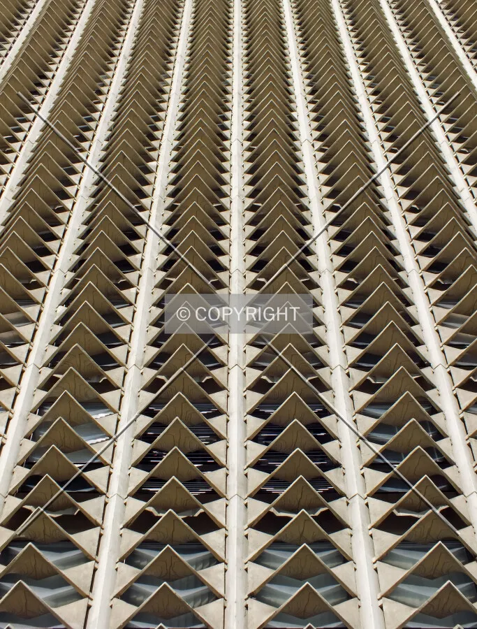 Looking up the northeastern facade of the building