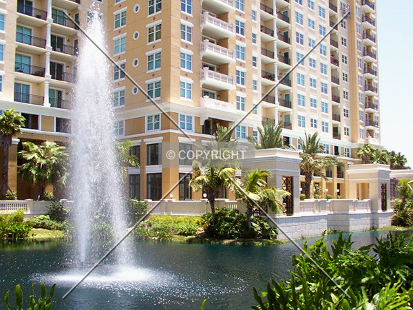 Pool and fountain in front of the building