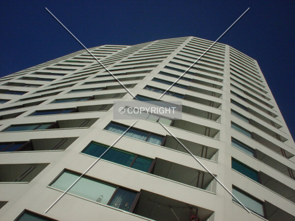 View along the facade to the top