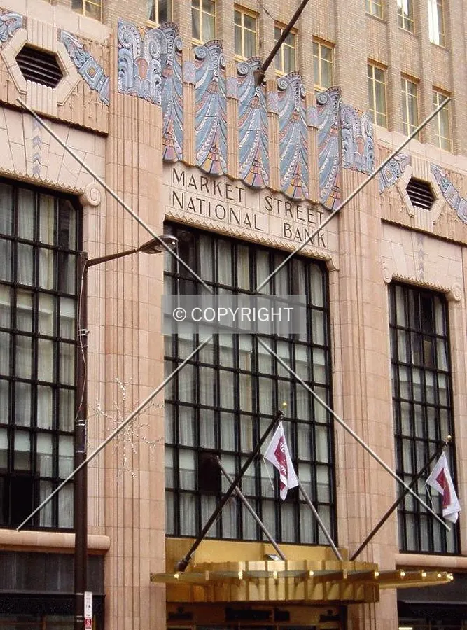 Details just above the entrance on the west side