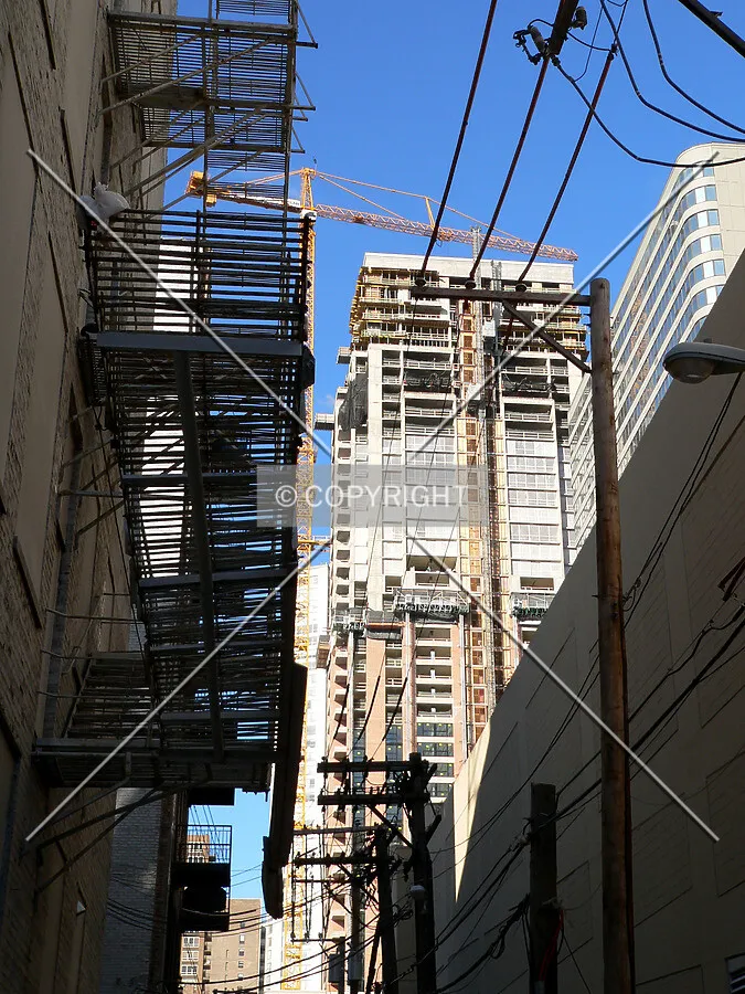 View to the north down an alley from 13th Street