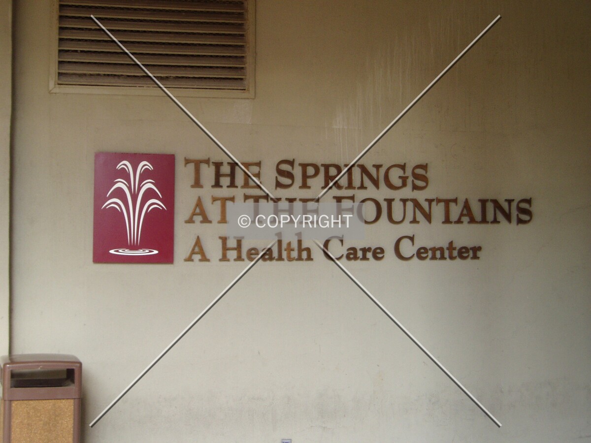 Sign on the west side of the first floor