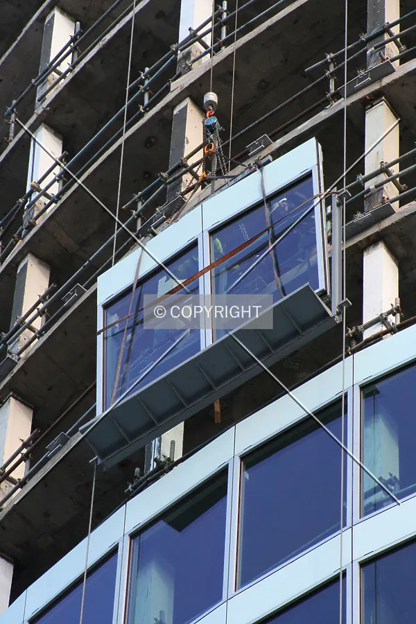 Facade panel being lifted