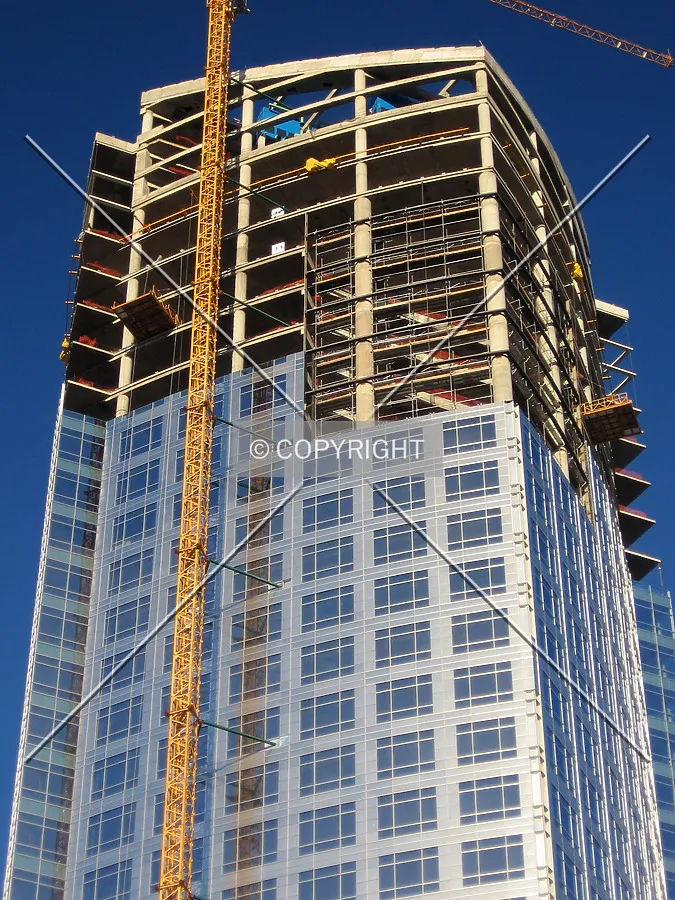Temporary panels will be inserted between the columns pending the arrival of the last curtain wall sections